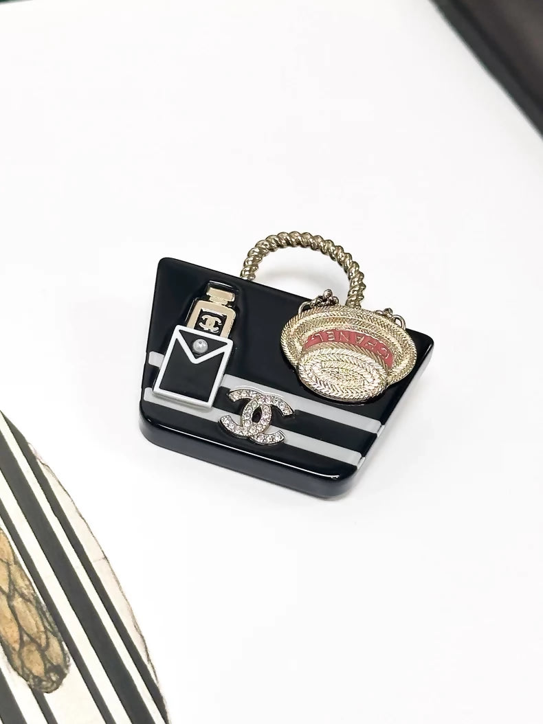 Chanel 21C Early Spring Black Acrylic Handbag Hat-Shaped Brooch