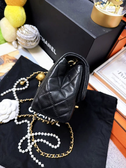 CHANEL 21b classic black and gold ball square bag
