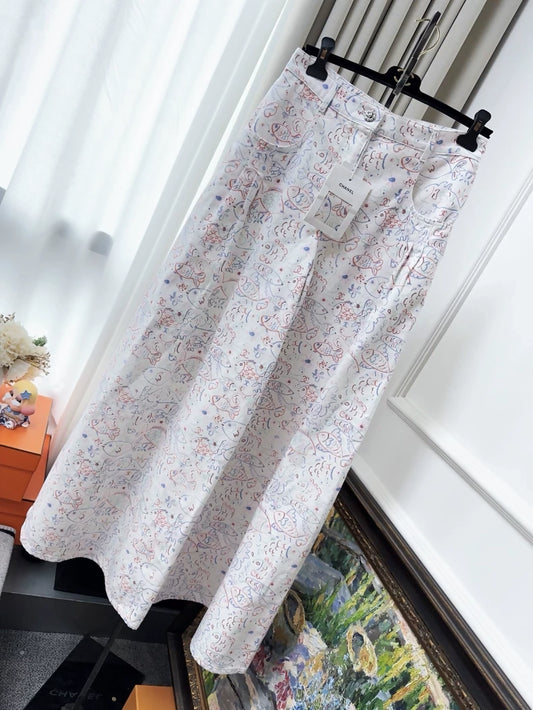 Chanel 25C wide-leg trousers with a colorful graffiti fish print