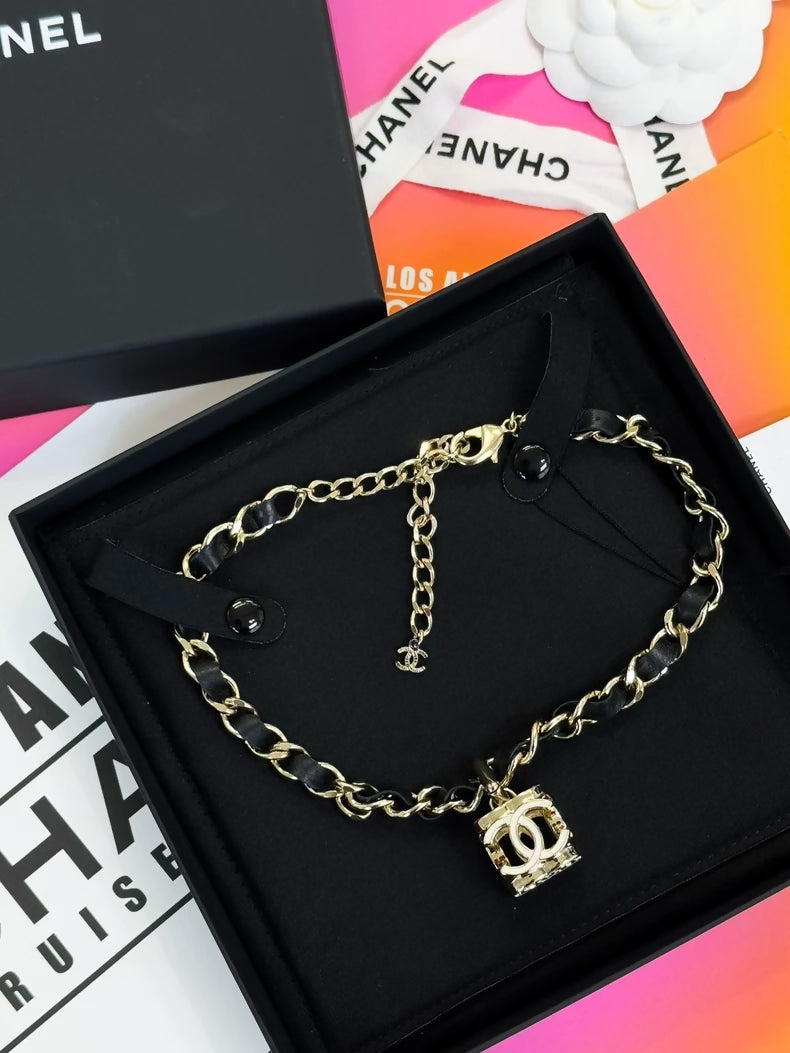 Chanel 22k dice white enamel double C pendant necklace