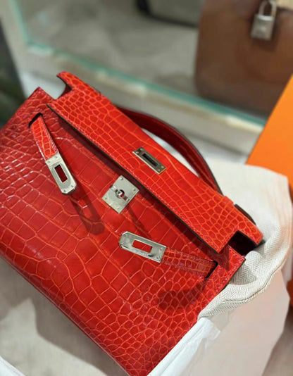 Hermès Kelly Pochette Red Shiny Alligator Palladium Hardware