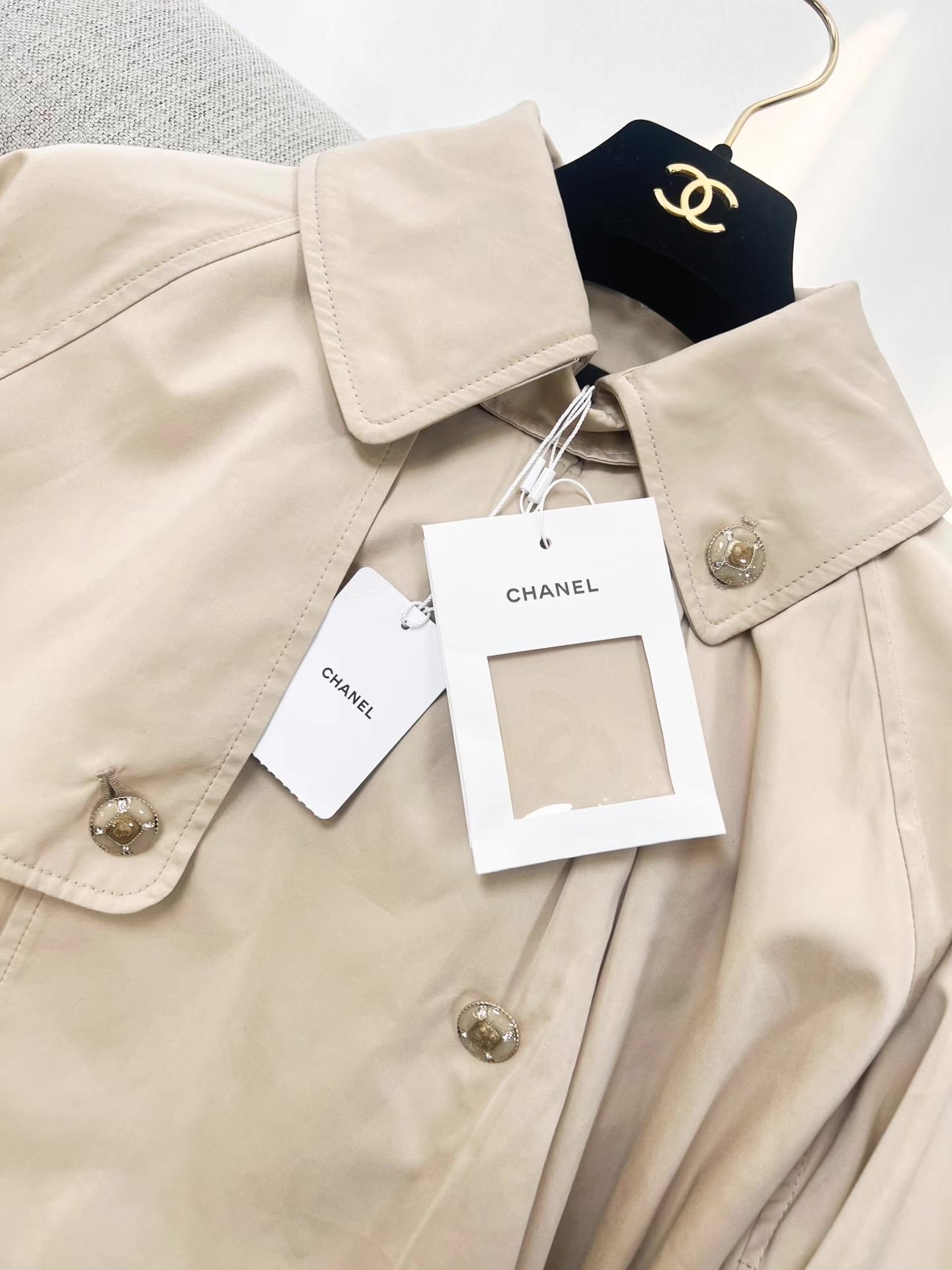 Chanel 25B trench coat with CC logo print