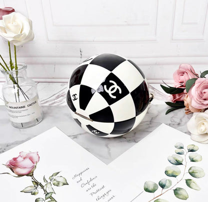 Chanel Black and White Resin and Enamel Checker Sphere Minaudiere Pale Gold Hardware, 2023