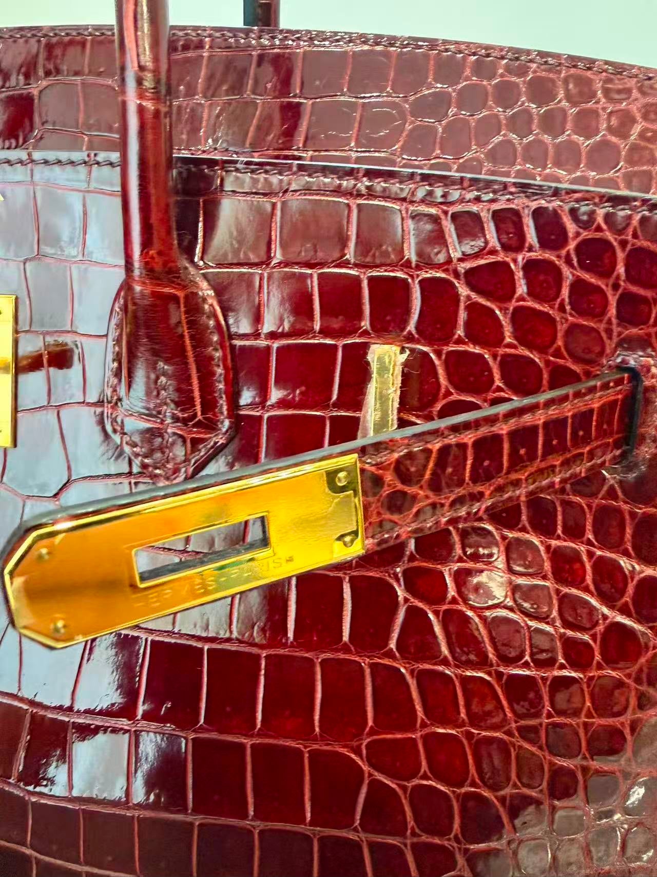 Rare Hermes Birkin 35 shiny Porosus Bordeaux Shiny Porosus Crocodile leather Gold hardware