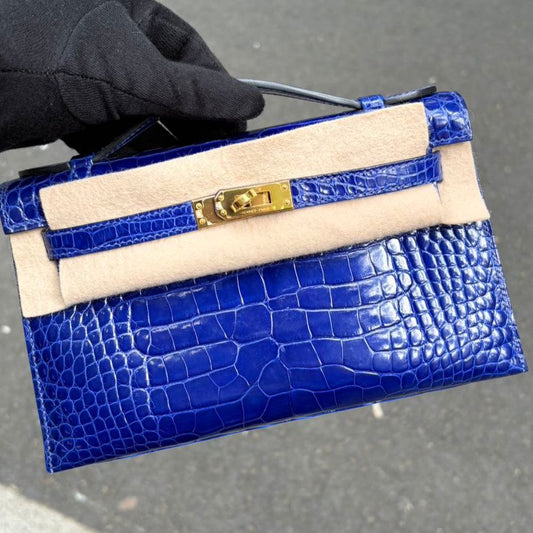 Hermes Kelly Pochette blue encre shiny alligator gold hardware