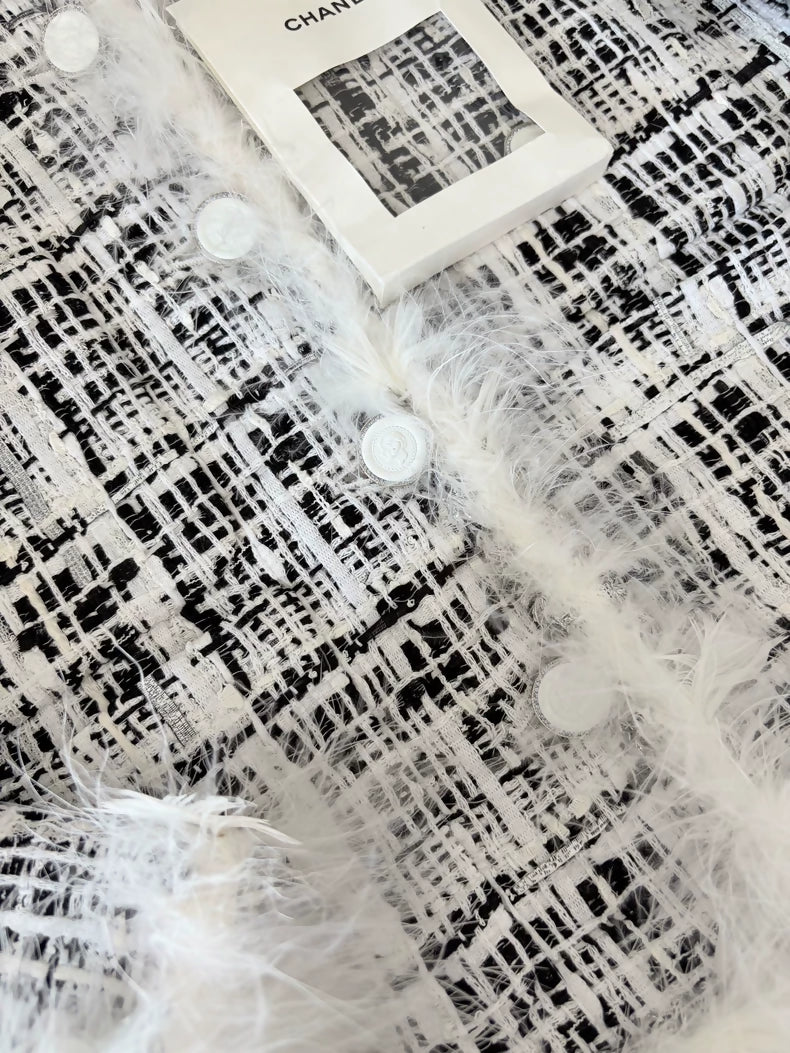Chanel 25s black and white feather tweed jacket