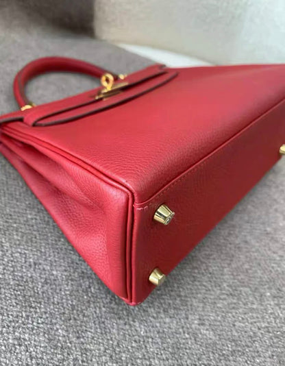 HERMES KELLY 25 RETOURNE ROUGE VIF TOGO GOLD HARDWARE