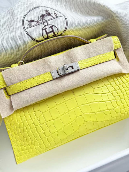 Hermes Kelly Pochette limoncello matte alligator leather palladium hardware