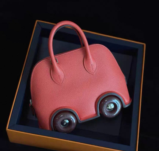 Hermès Bolide on Wheels 1923 Rose Texas & rouge H Epsom Leather Palladium Hardware