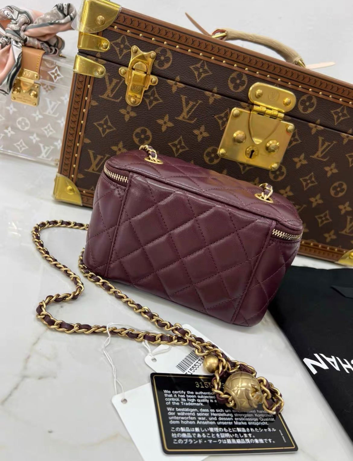 Chanel gold ball mini case chain bag in burgundy