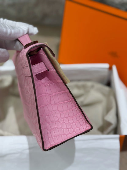 Hermès Kelly Pochette Pink Bubblegum 5P Matte alligator Leather Gold Hardware