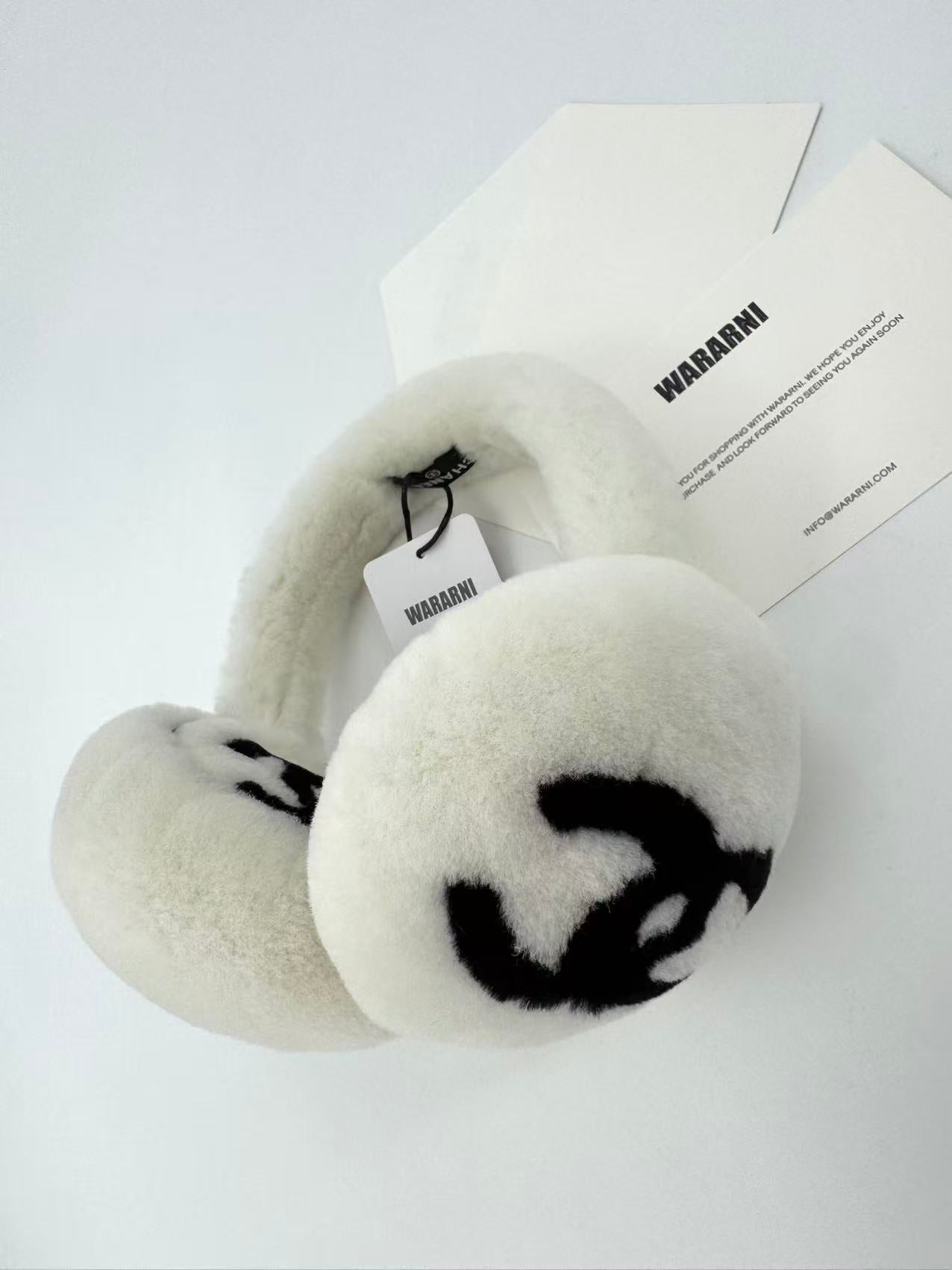 Chanel coco neige black & White earmuffs
