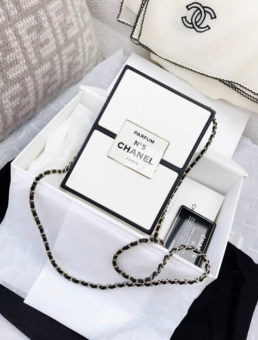 CHANEL 21SS A LIMITED EDITION WHITE & BLACK LEATHER CHANEL NO. 5 PARFUM BOX CLUTCH