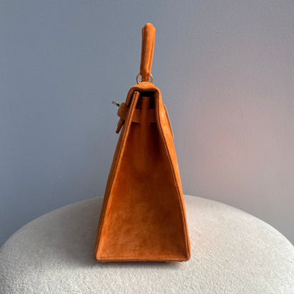 Hermès Kelly 25 Orange Doblis suede leather gold diamond hardware (Extremely rare)