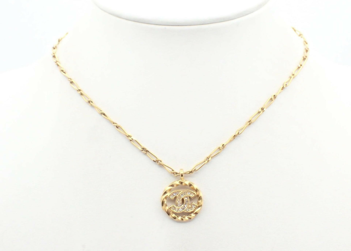 Chanel Vintage 1982 Rhinestone Gold Plated Braided Medallion Interlocking Coco Mark Necklace