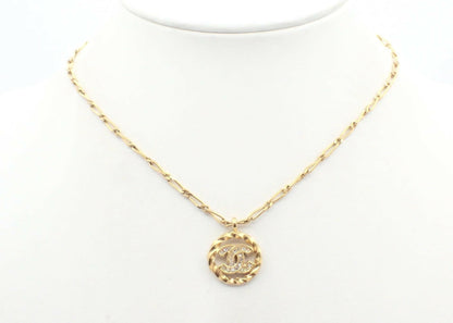 Chanel Vintage 1982 Rhinestone Gold Plated Braided Medallion Interlocking Coco Mark Necklace