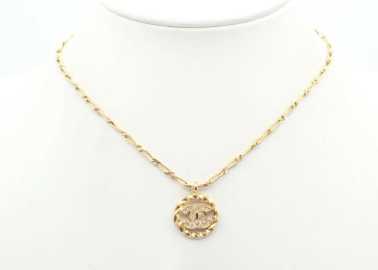 Chanel Vintage 1982 Rhinestone Gold Plated Braided Medallion Interlocking Coco Mark Necklace