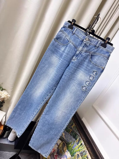 Chanel 25M blue jeans with embroidered lettering