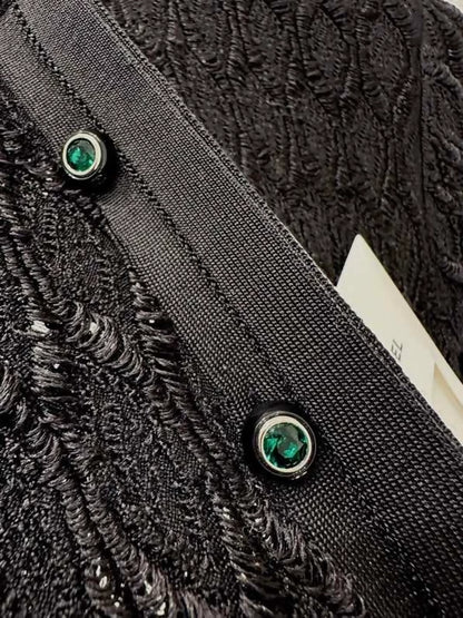 Chanel 26B black cardigan with green buttons