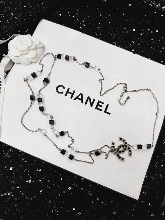 Chanel double C waist chain in black and white glass