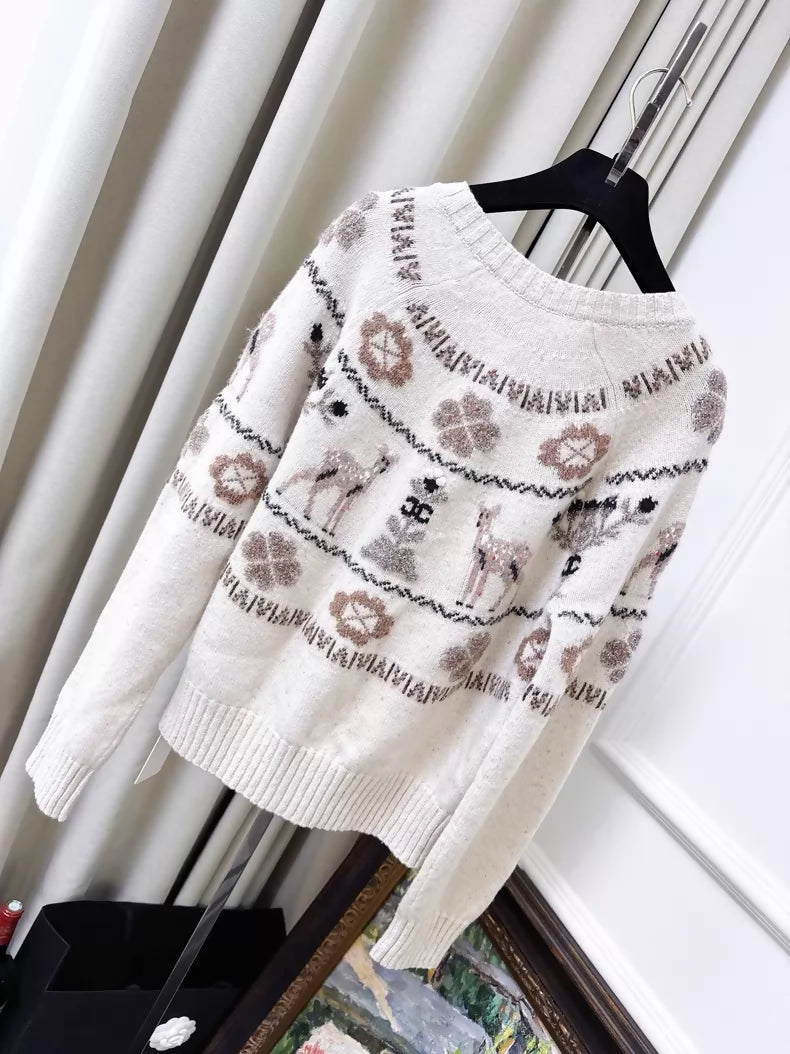 Chanel 25N beige cashmere cardigan with reindeer and four-leaf clover