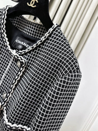 Chanel 25c black and white checkered jacket