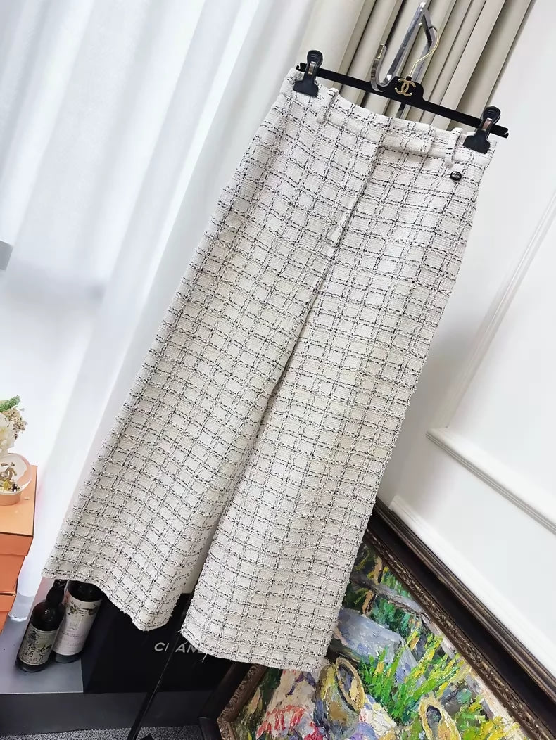 Chanel 20p black and white check wide-leg trousers