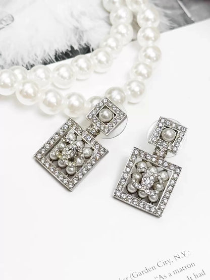 Chanel Spring/Summer 2024 silver double C pearl stud earrings