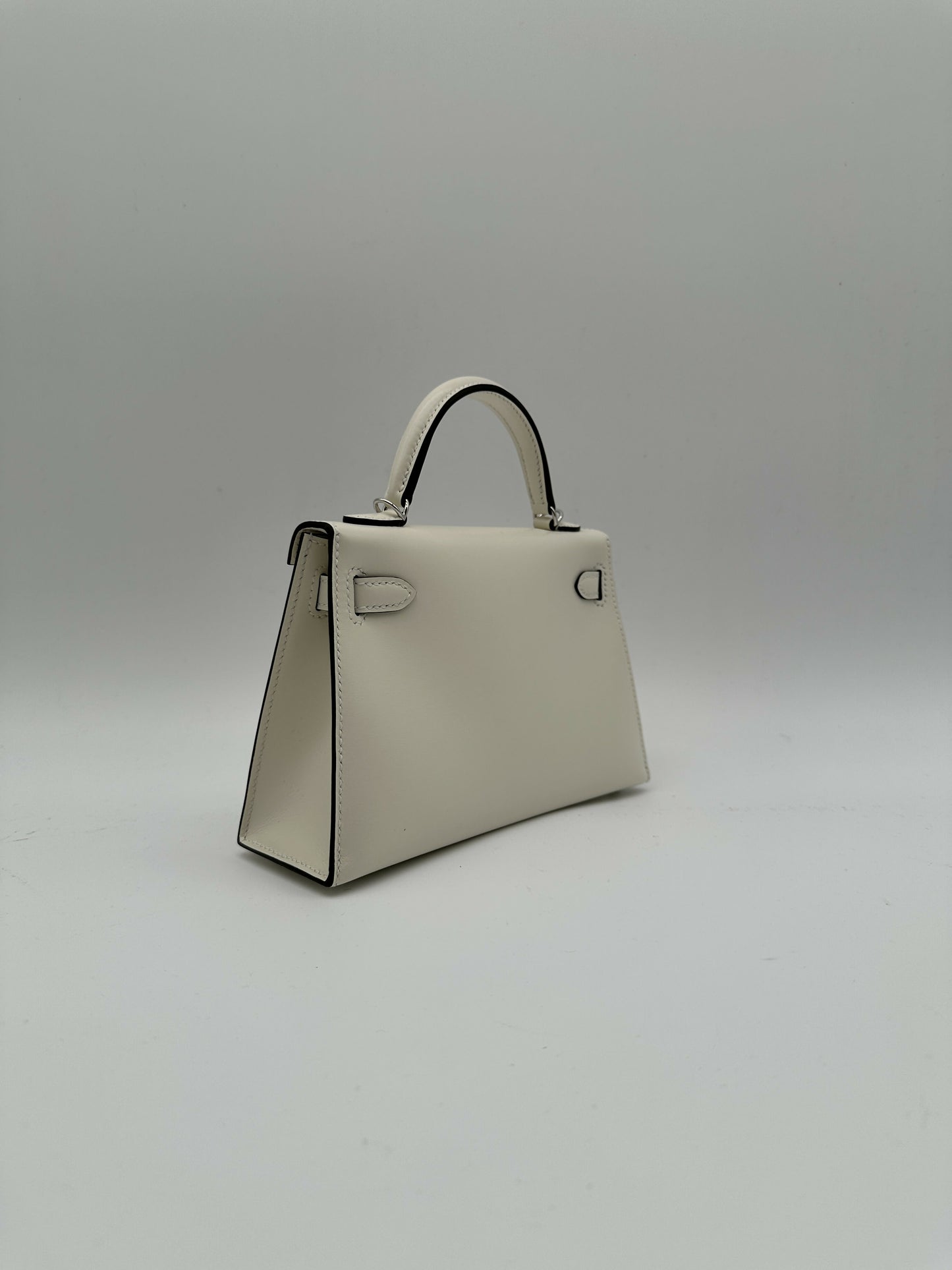 Hermès Kelly 20 Clouté Cream PHW G 2026
