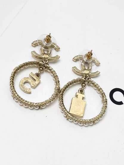 Chanel gold circle pearl pendant earrings