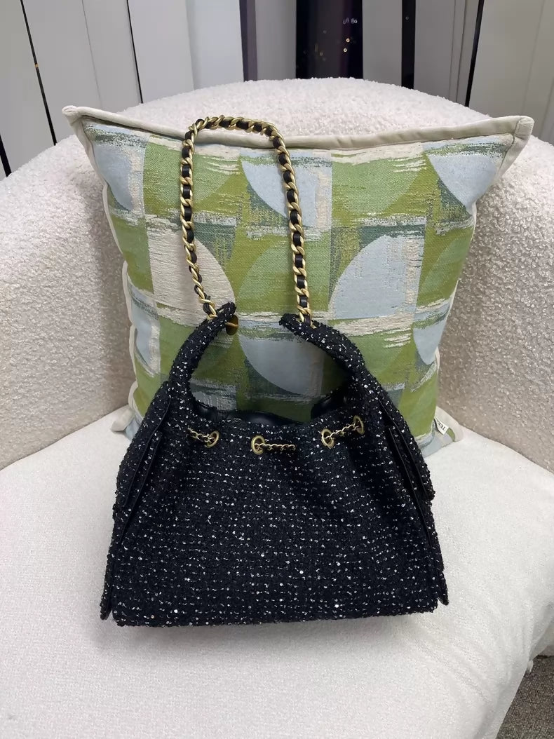 Chanel 25A black sequined tweed 25 bag