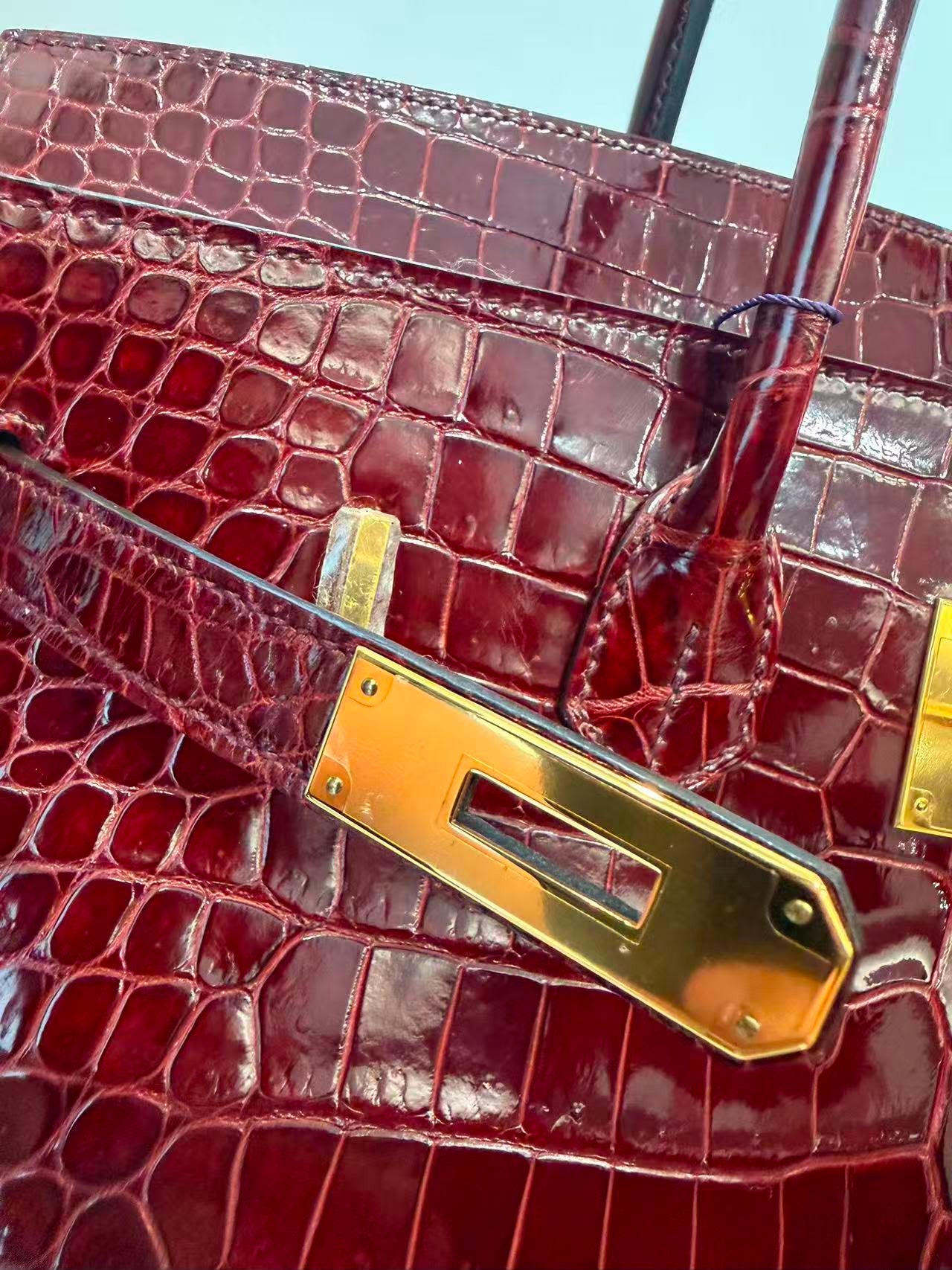 Rare Hermes Birkin 35 shiny Porosus Bordeaux Shiny Porosus Crocodile leather Gold hardware
