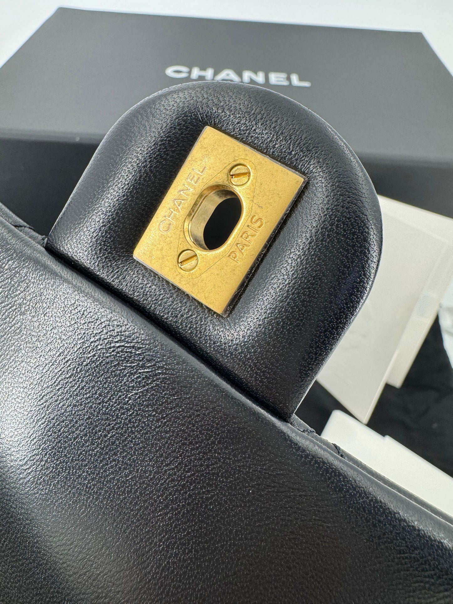 Chanel black mini flap bag with gold hardware