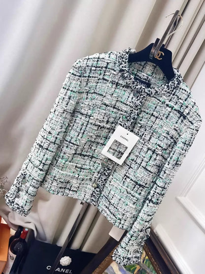 Chanel 26s green tweed jacket