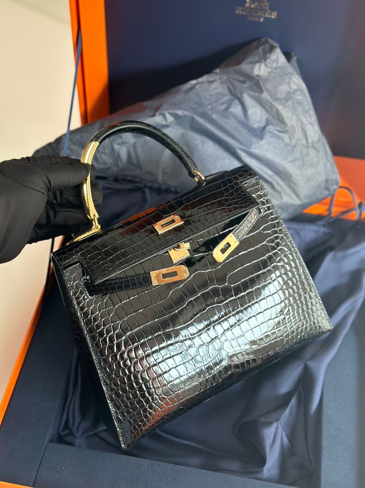 Hermès Kelly Midas 25 Noir Shiny Crocodile Porosus 18k yellow gold hardware & handle