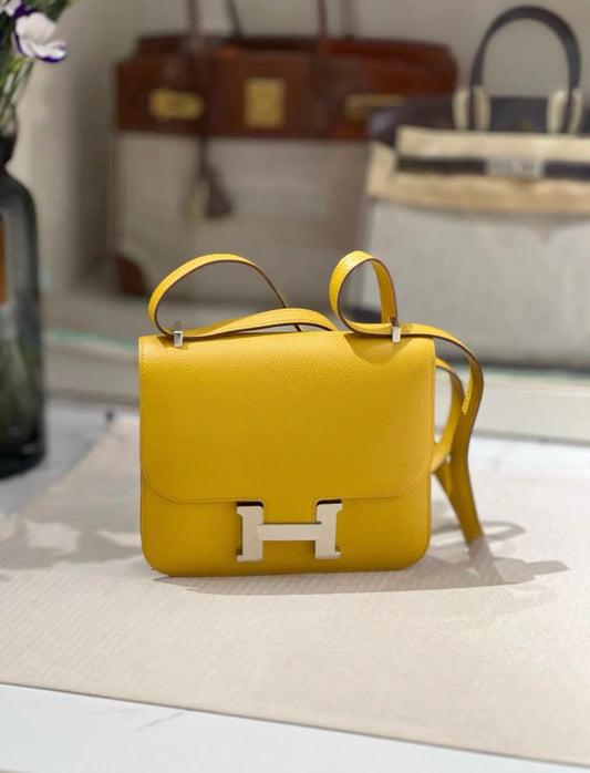 HERMÈS Constance Mini 19 shoulder bag in Jaune Ambre Epsom leather with Palladium hardware