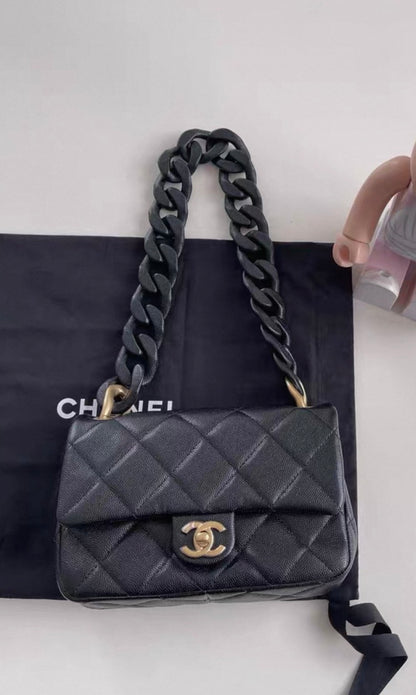 Chanel 24P Black leather wooden chain hardware