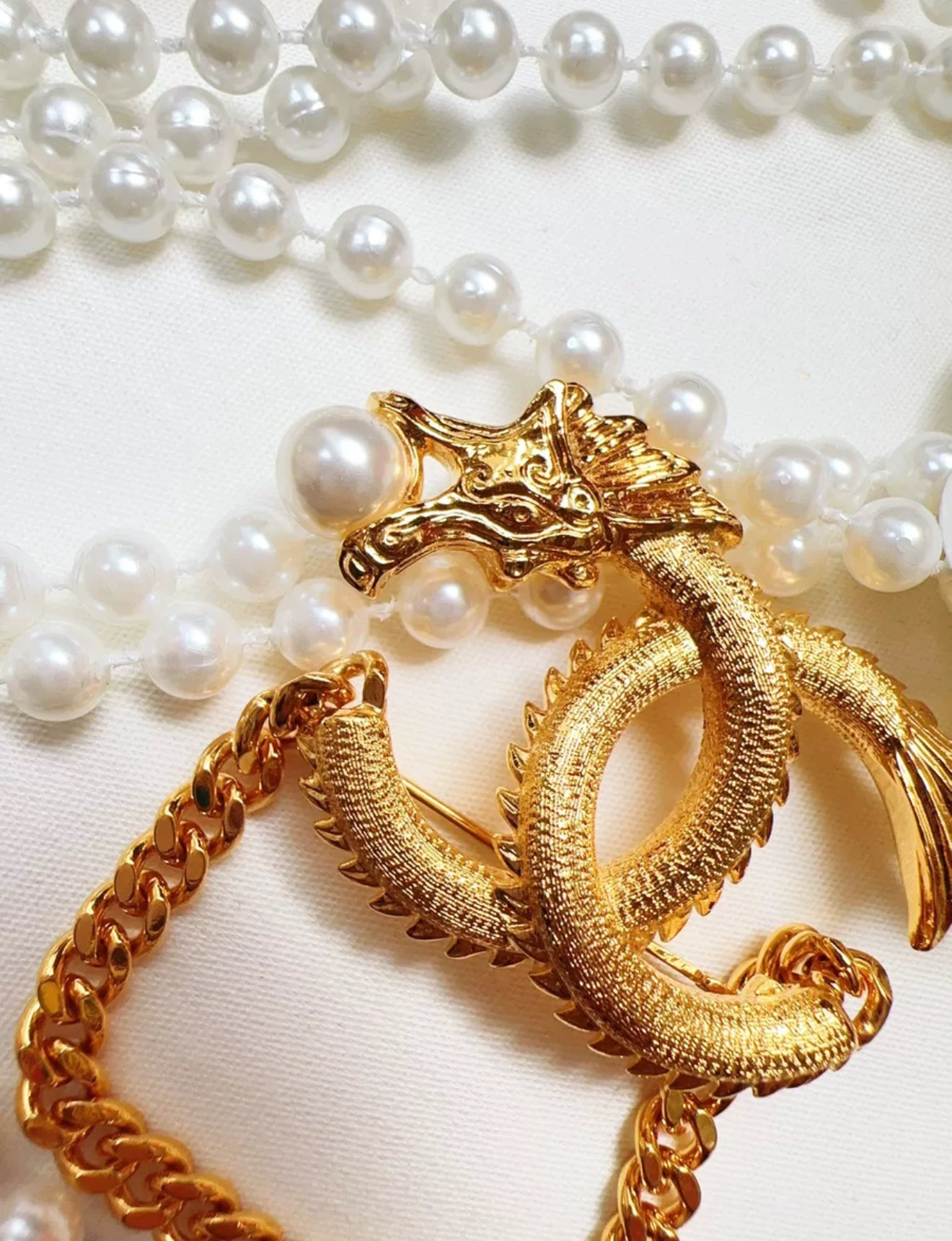 Chanel 24 dragon brooch