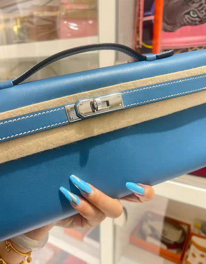 Hermès Kelly Cut Blue Jeans Swift Leather palladium hardware