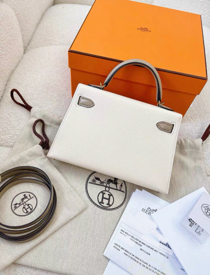 Hermès Special Order (HSS) Kelly 20 Nata and Gris Etoupe Chevre Permabrass Hardware stamp B, brand new