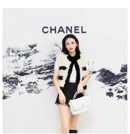 Chanel 21K black and white four-pocket fur vest size 36