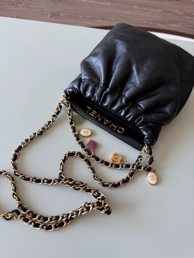Chanel 23P black leather bag with Charms