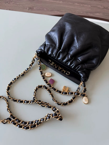 Chanel 23P black leather bag with Charms