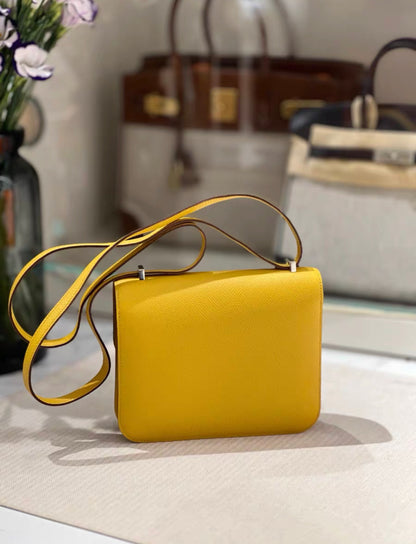 HERMÈS Constance Mini 19 shoulder bag in Jaune Ambre Epsom leather with Palladium hardware