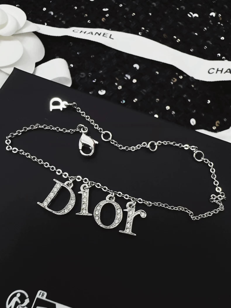 Dior bracelet with a letter pendant fully set with diamonds