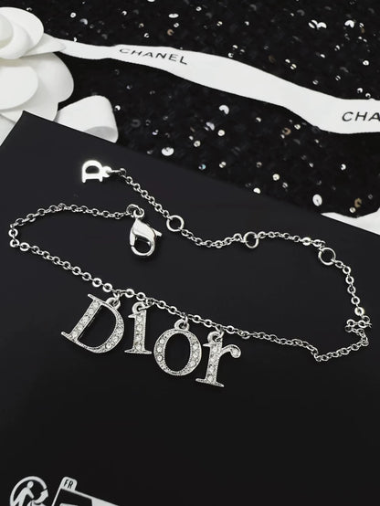Dior bracelet with a letter pendant fully set with diamonds