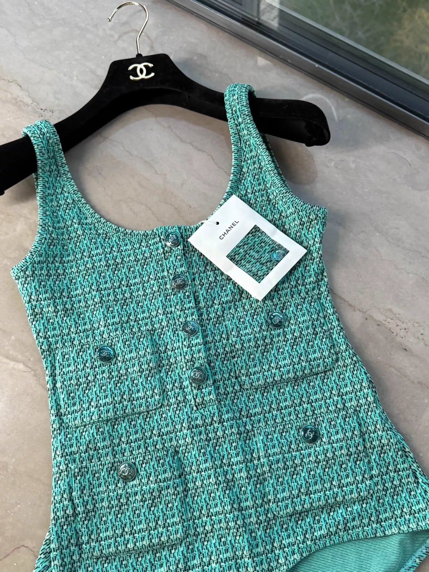Chanel 25C green swimsuit
