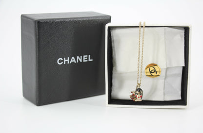 Chanel Vintage 05P Metal Doll Head & Red CC Necklace