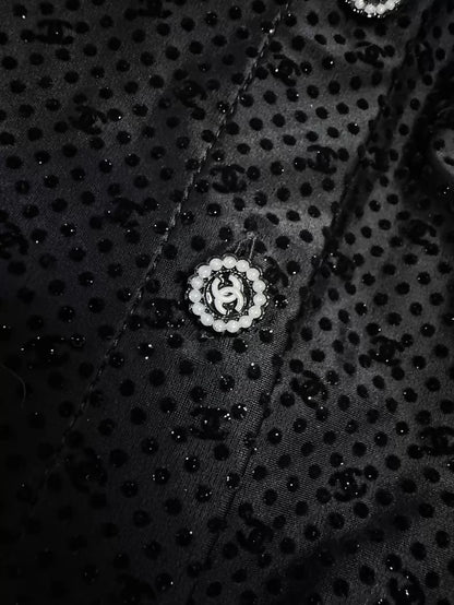 Chanel 24b black velvet polka dot shirt with subtle logo print and shimmer