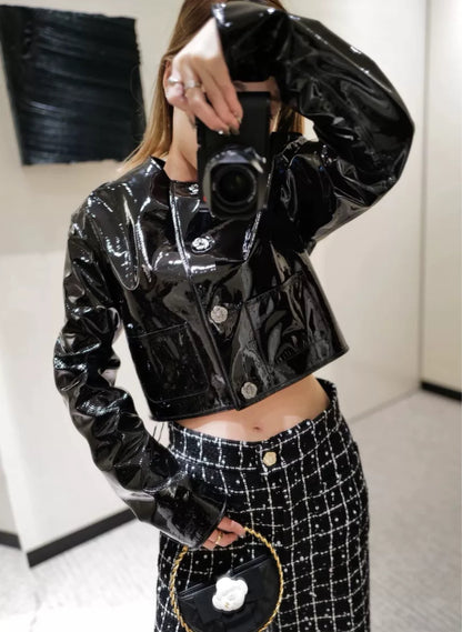 Chanel 23k black patent leather jacket